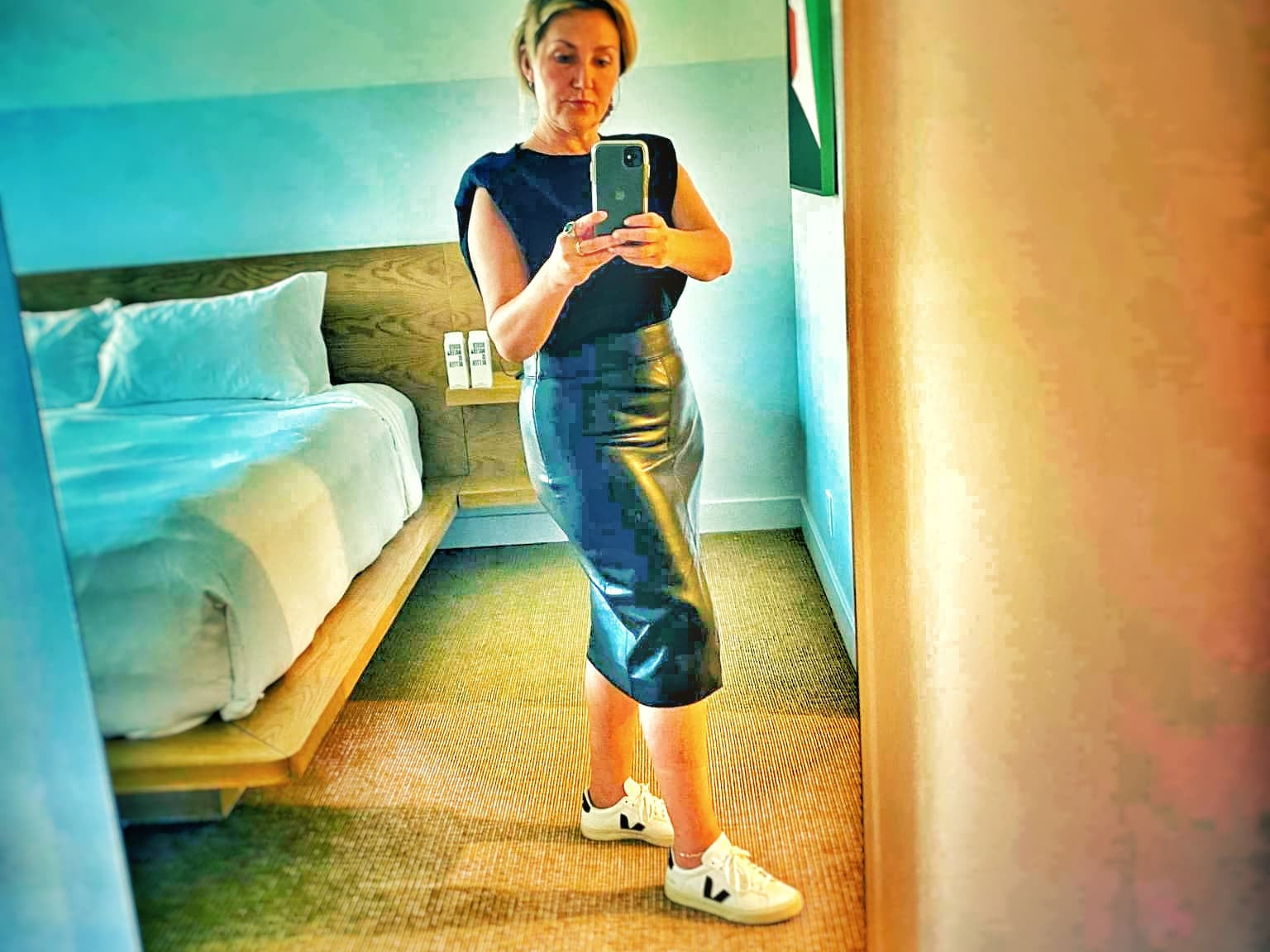 Margaret Thouez pauses from working on the road in her hotel room as part of her back to work post COVID routine at Love Local Products
