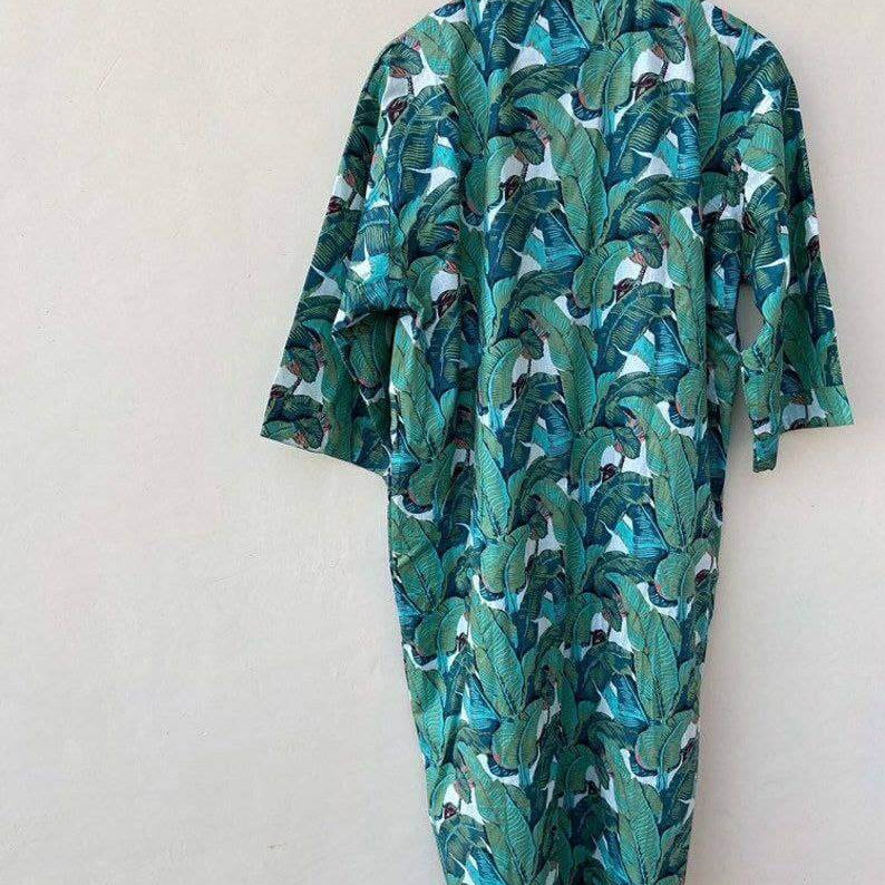 Back view of a Bohemian Pure Cotton Banana Leaf Kimono Bath Robe, showcasing vibrant green leaf print, handmade and organic.