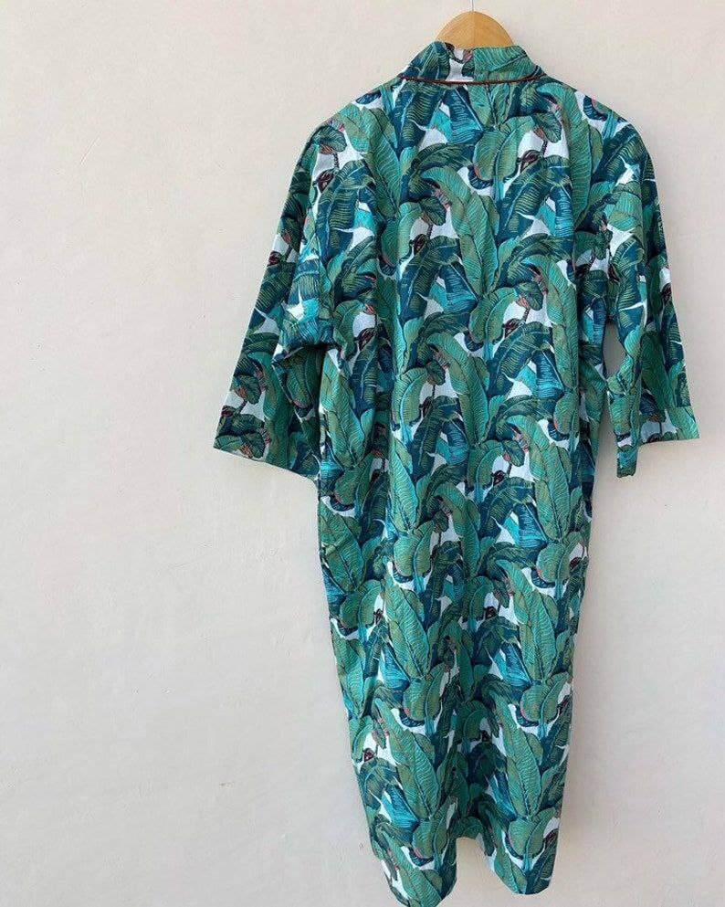 Back view of a Bohemian Pure Cotton Banana Leaf Kimono Bath Robe, showcasing vibrant green leaf print, handmade and organic.