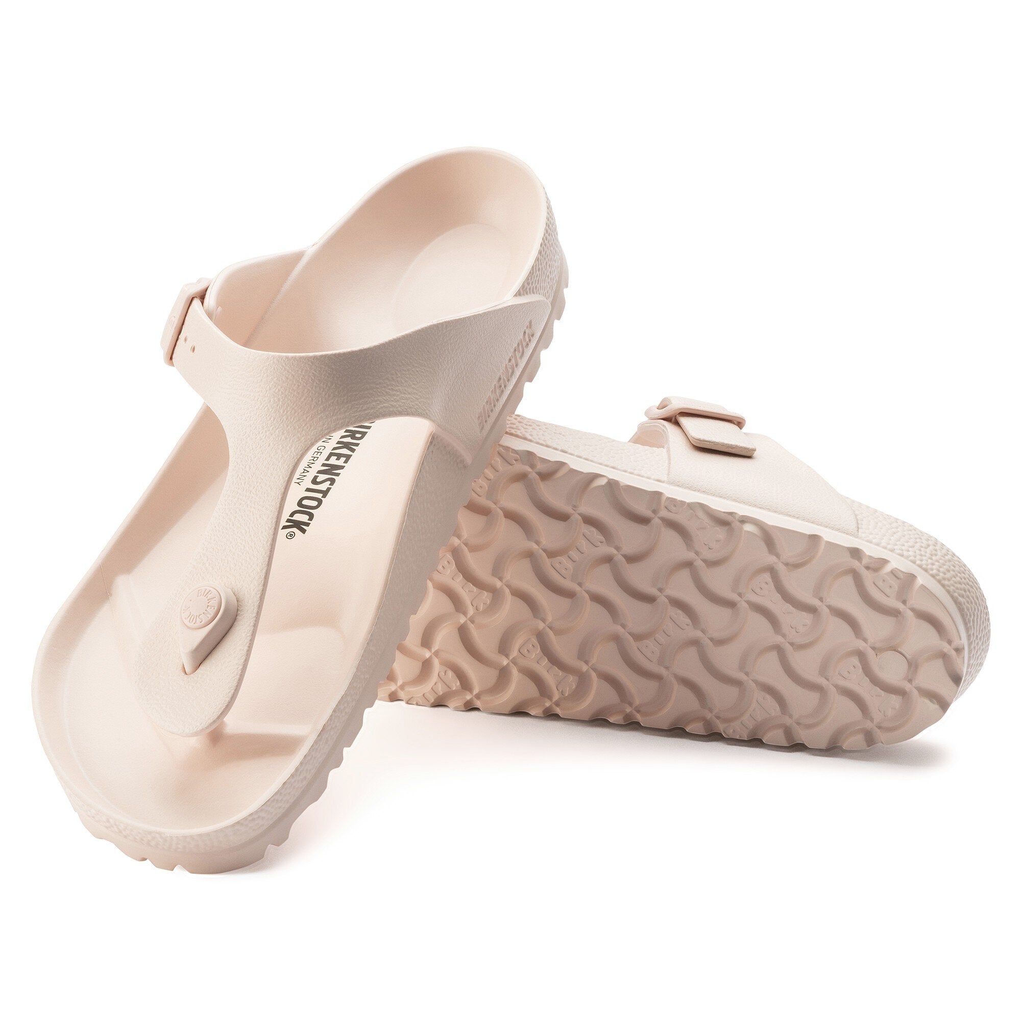 Birkenstock Gizeh Essentials EVA sandals in light rose, shock-absorbing, waterproof, and flexible for beach or spa.
