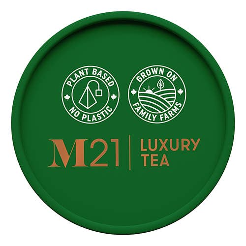 Eco-friendly tea branding with plant-based and family farm icons on a green background.