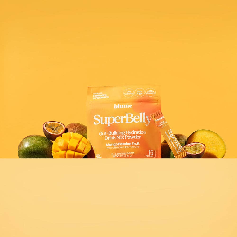 SuperBelly Mango Passionfruit Gut Mix with mango and passionfruit on a vibrant yellow background