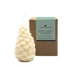 White pillar candle in pinecone shape with box