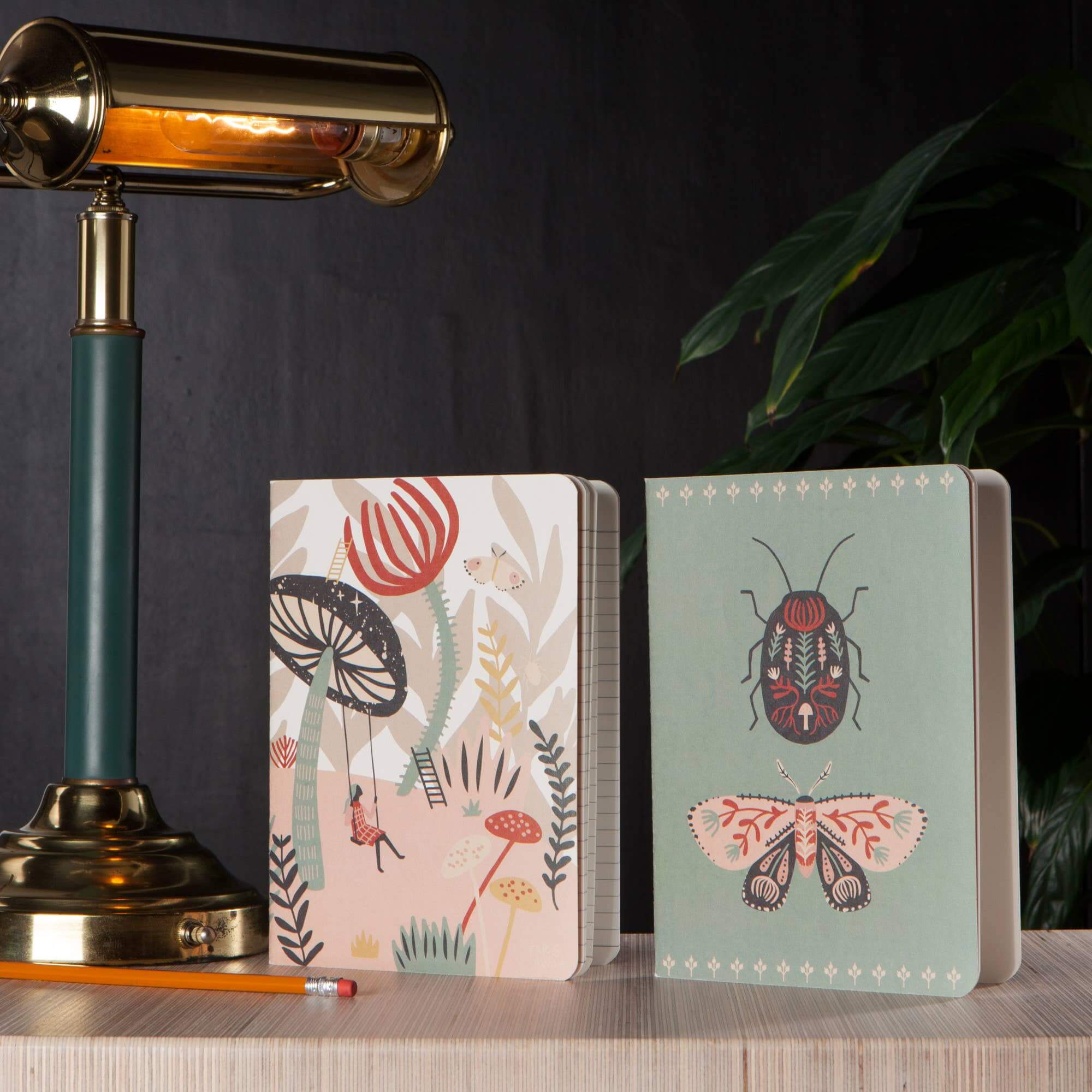 Danica Studio Far And Away Notebooks, set of 2, designed with whimsical illustrations and a cozy cottage core theme.