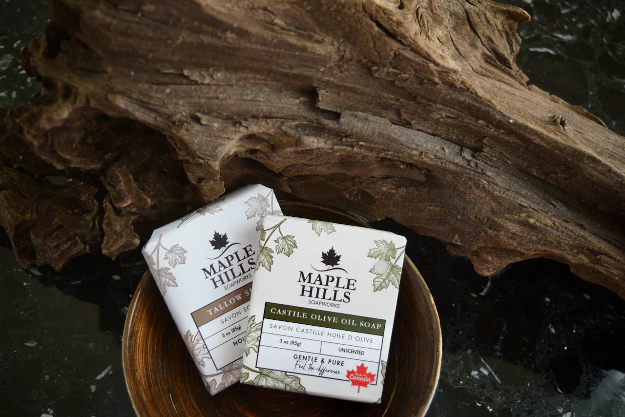 Maple Hills Soapworks soaps on a cedar log