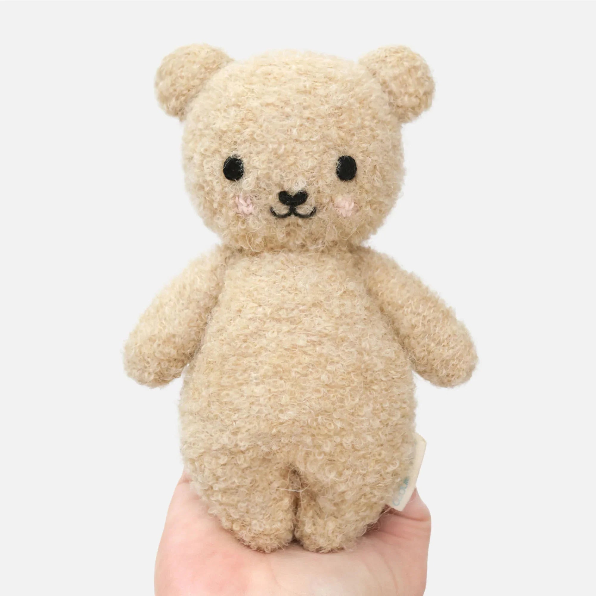 Wild Baby Bouclé Baby Bear – Honey – Size Reference on Hand