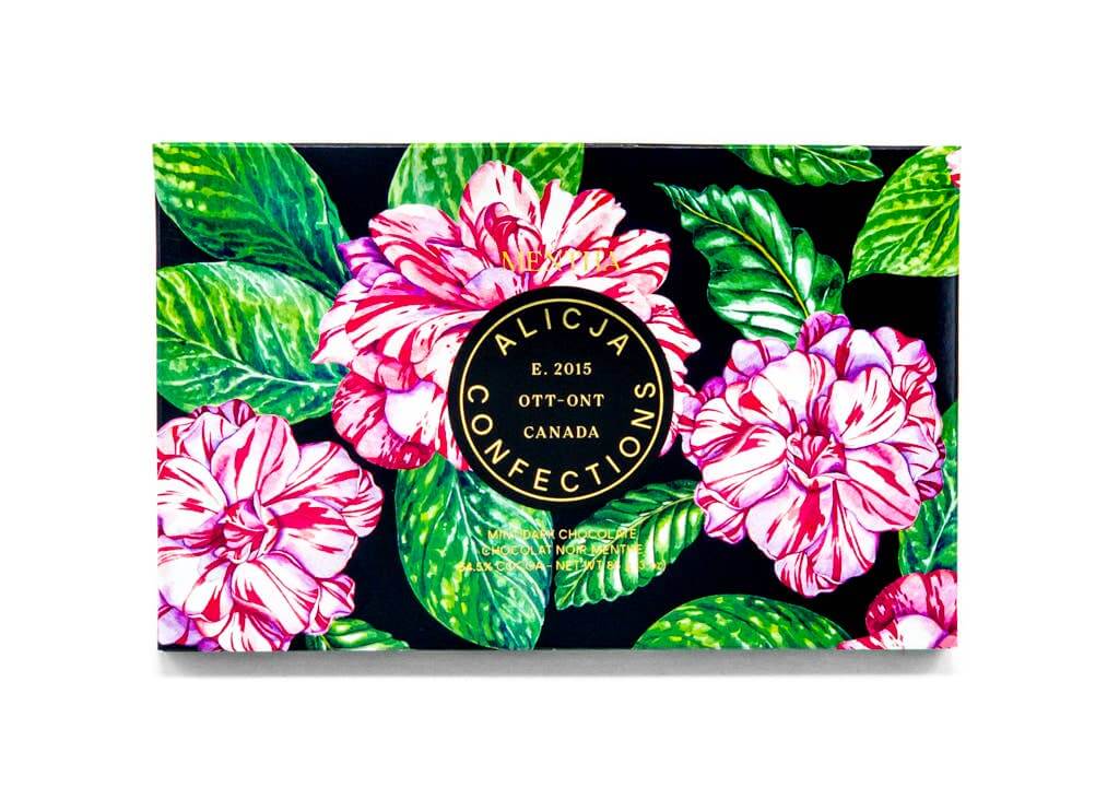 Alicja Confections chocolate box featuring vibrant floral design with pink flowers and green leaves, E. 2015, Ottawa, Canada.