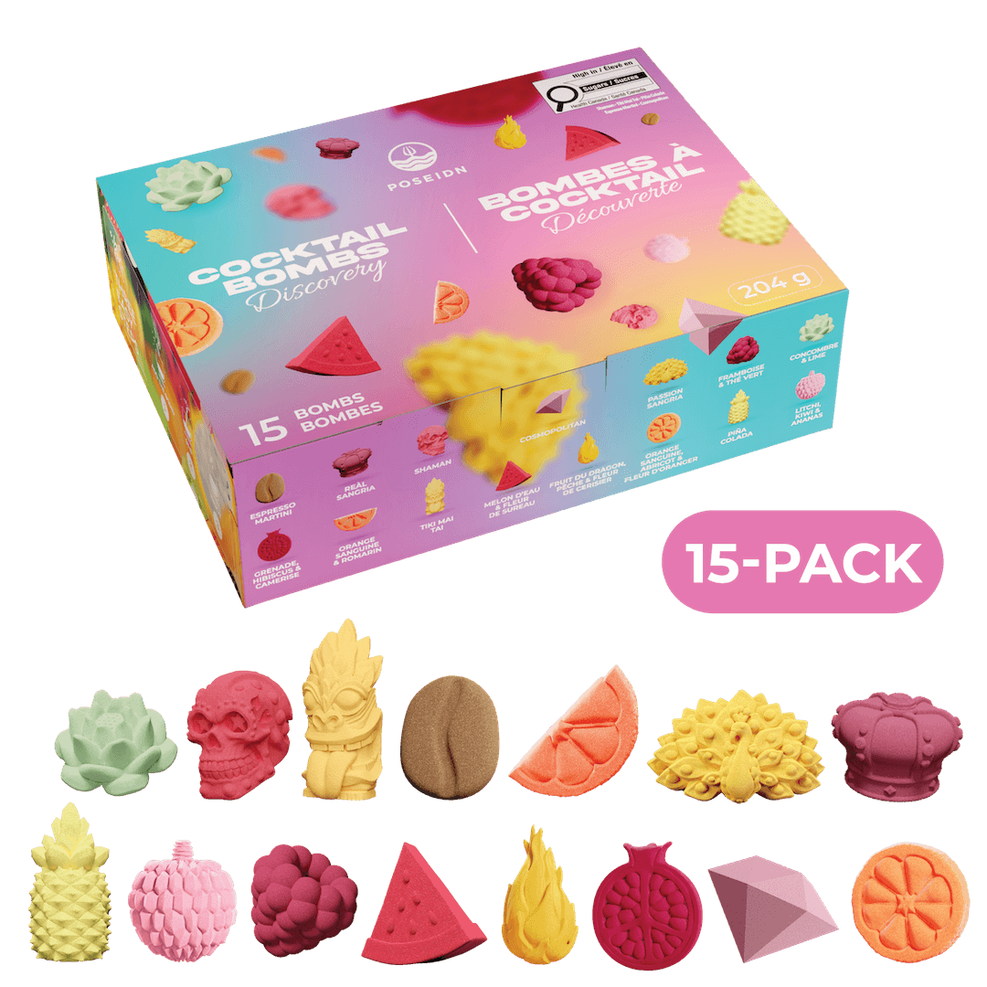 A colorful boxed set of novelty cocktail-themed edible bombs displayed on a black background, with a pink '15-PACK' badge and several sample edible bomb shapes arranged in front. The box reads 'BOMBS A COCKTAIL Discovery' and shows multiple bright flavor illustrations.