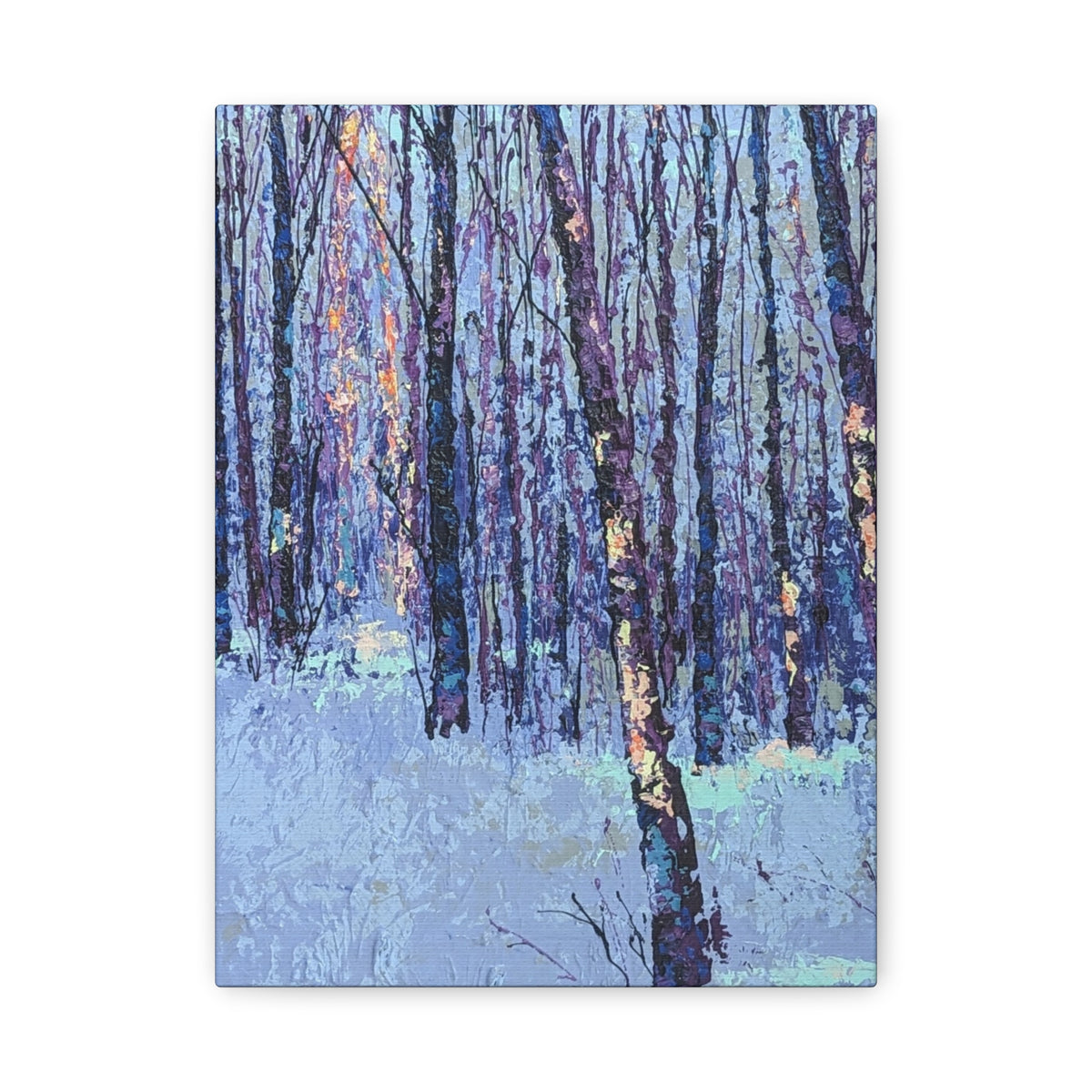 A vertical canvas wall art print depicting an impressionistic winter forest scene with slender dark tree trunks and a pale blue, purple, and white ground, shown against a plain white background.