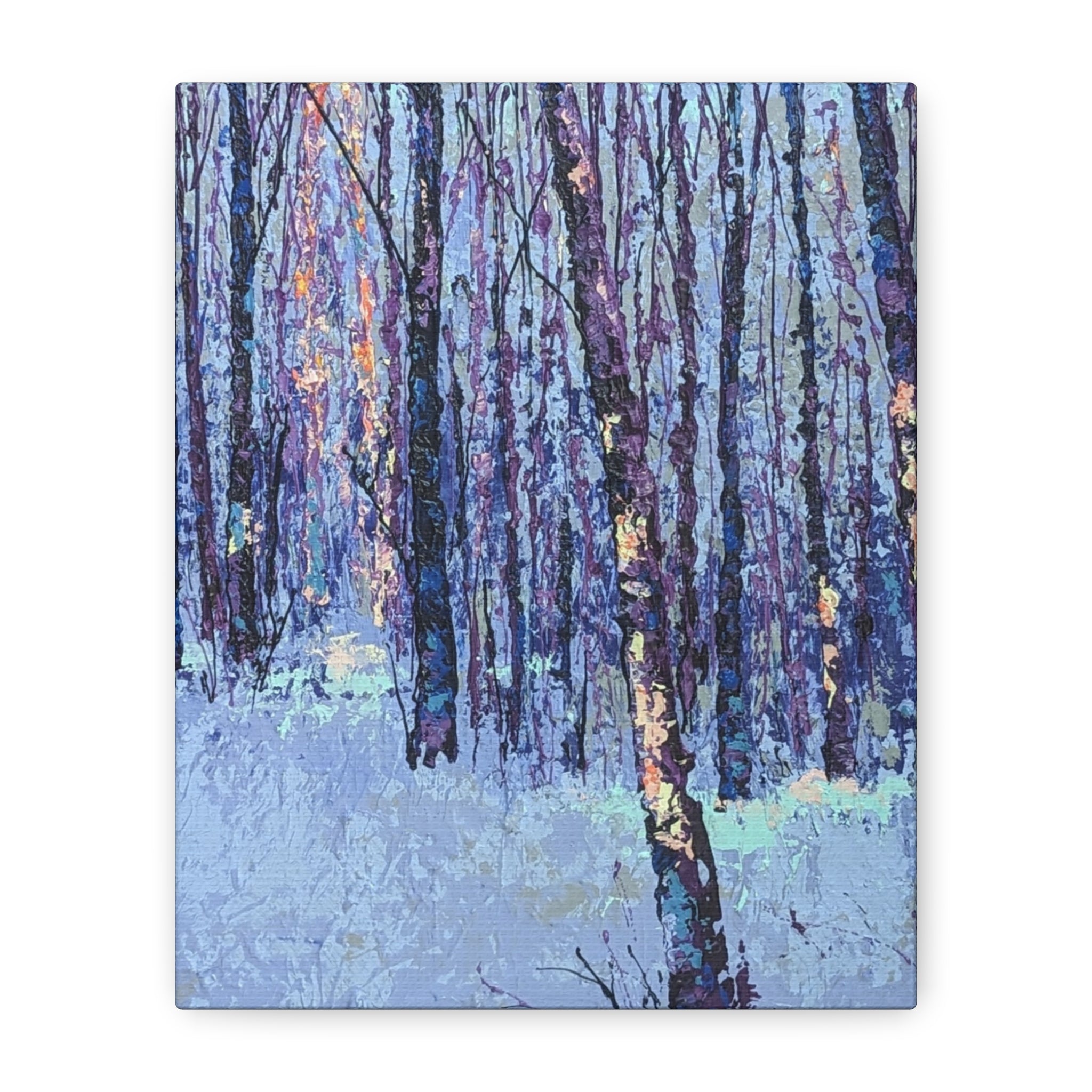 A vertical canvas wall art print depicting an impressionistic winter forest scene with tall dark tree trunks and a snowy ground in shades of blue, purple, and white.