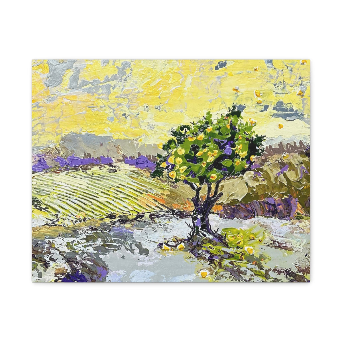 Restless is the Wind Canvas Print | Nancy Overbury An impressionist landscape painting featuring a prominent green tree with yellow fruit, set against a bright yellow sky and lavender fields, shown on a white background.