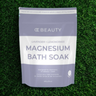 OC Beauty Lavender + Lemongrass Magnesium Bath Soak package on grass