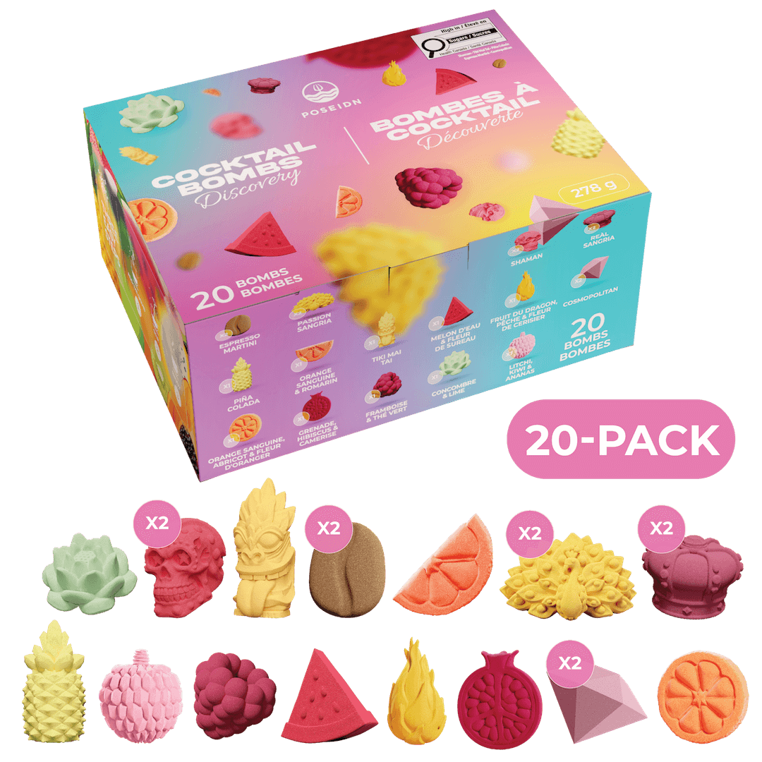 A colorful box of Nourition Cocktail Bombs Discovery set shown on a black background, with 20 assorted molded candy bombs arranged below and a pink '20-PACK' badge. The box features illustrations of different fruit and drink-themed bombs, and the candies below are labeled by quantity with pink circles.