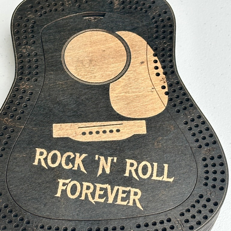 Guitar-shaped cribbage board with 'Rock 'N' Roll Forever' text on a white background