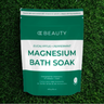 Eucalyptus + Peppermint Magnesium Bath Soak package on a grass background