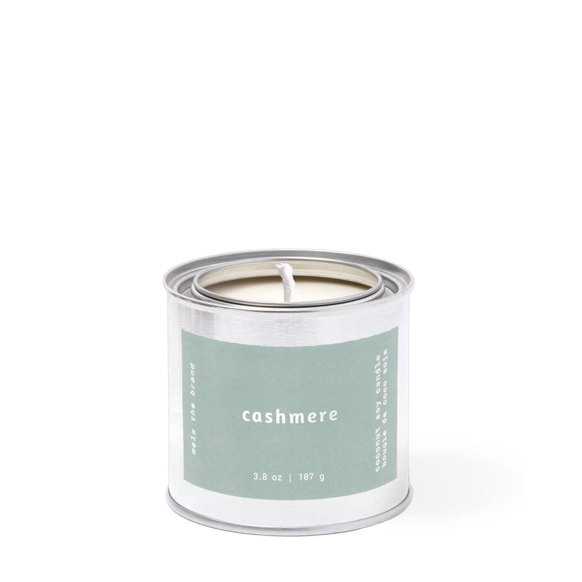 Candle in a tin labeled 'cashmere' on a white background