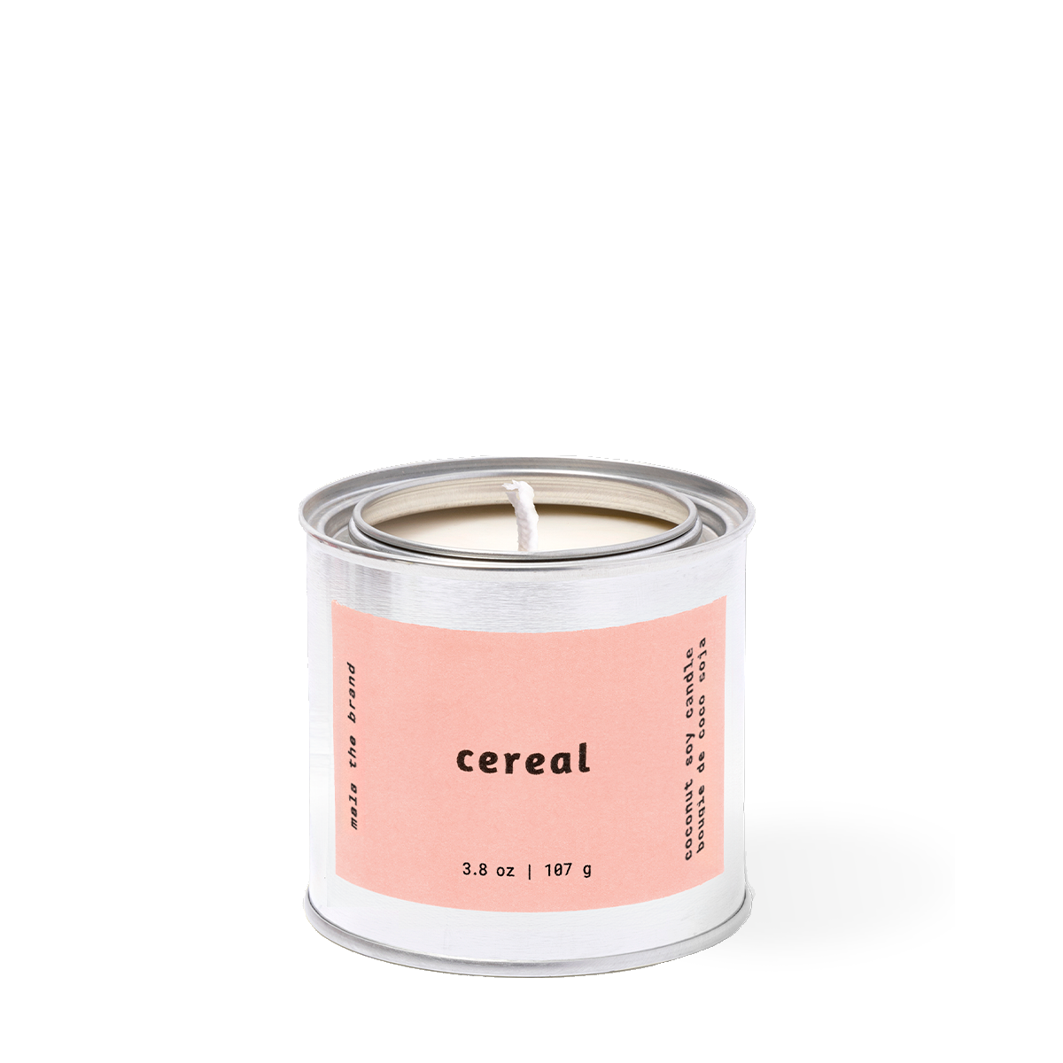 Candle in a can labeled 'cereal' on a white background