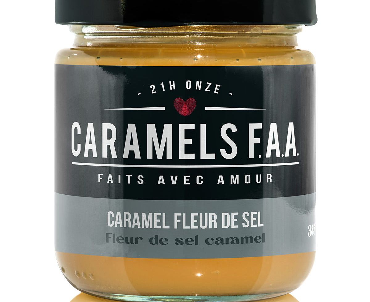 Jar of Caramels F.A.A. caramel with a black lid on a white background