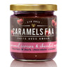 Jar of Caramels F.A.A. with a gold lid on a white background