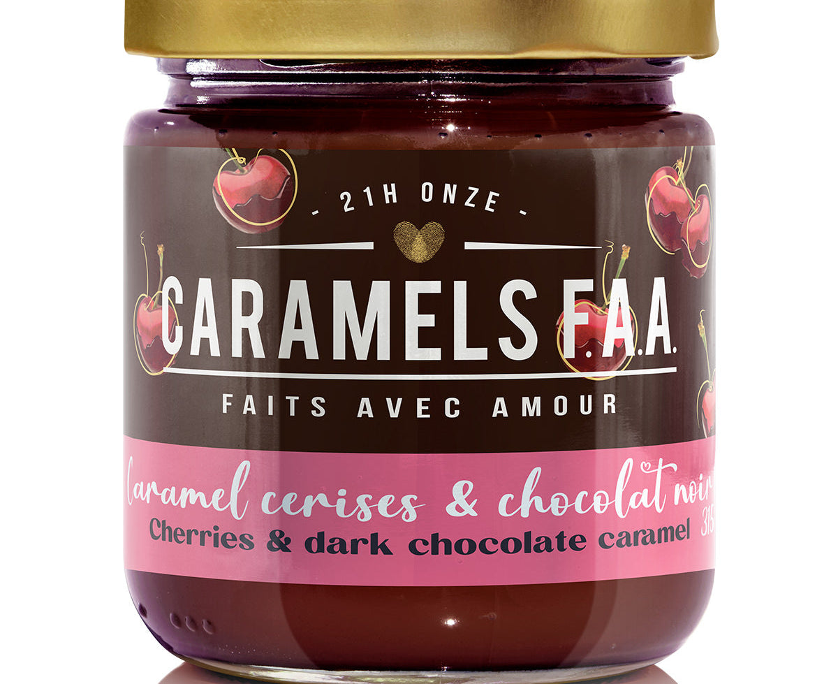 Jar of Caramels F.A.A. with a gold lid on a white background