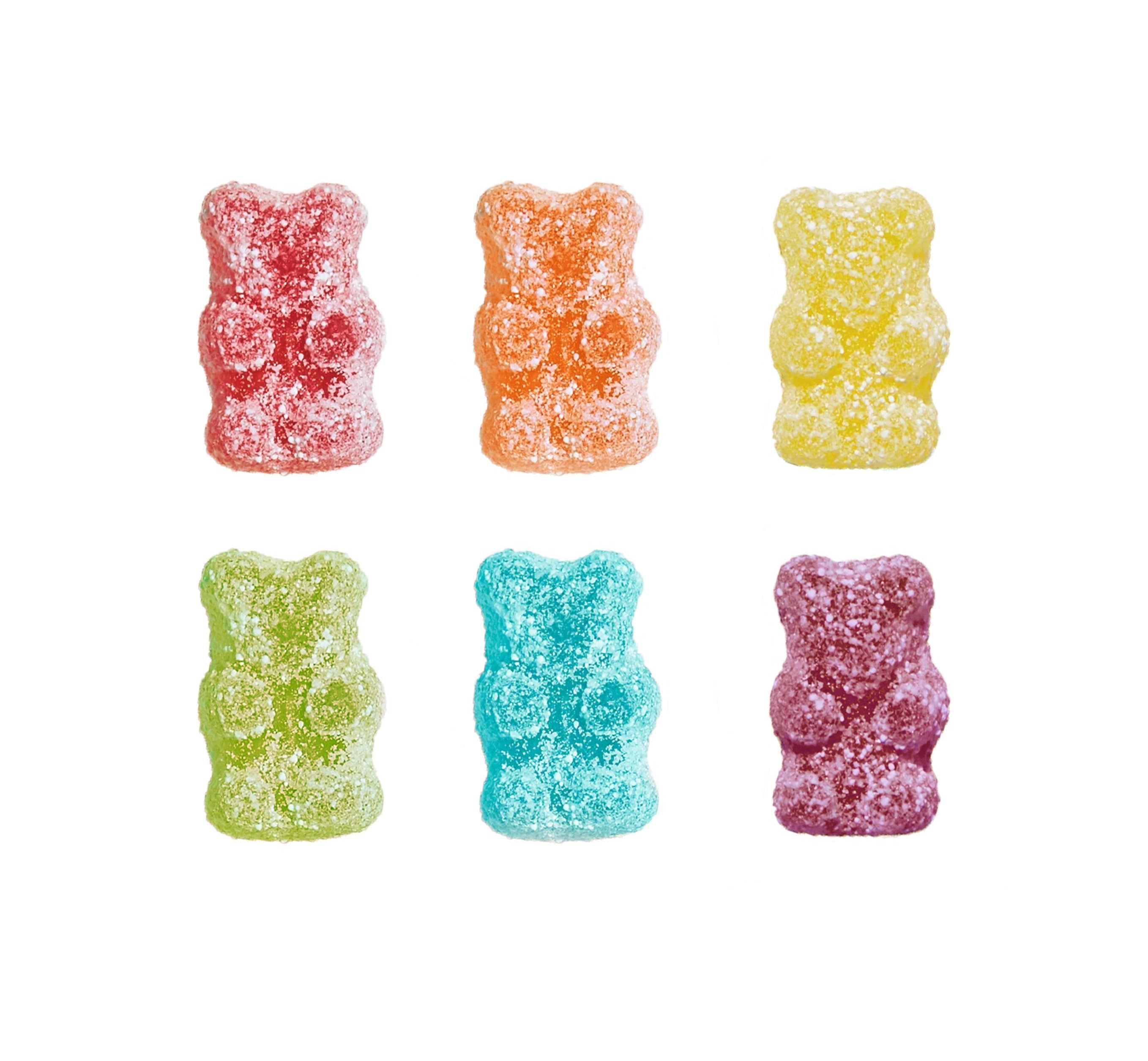 Six colorful gummy bear candies on a white background