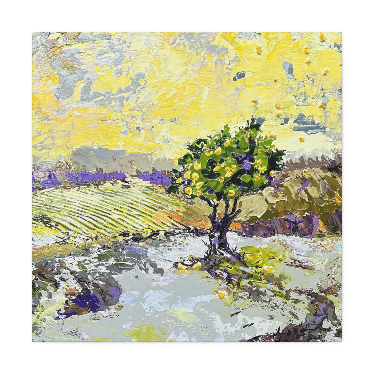 Restless is the Wind Canvas Print | Nancy Overbury An impressionistic landscape painting featuring a solitary green tree with yellow blossoms in a field, rendered in textured brushstrokes of yellow, green, white, gray, and purple.