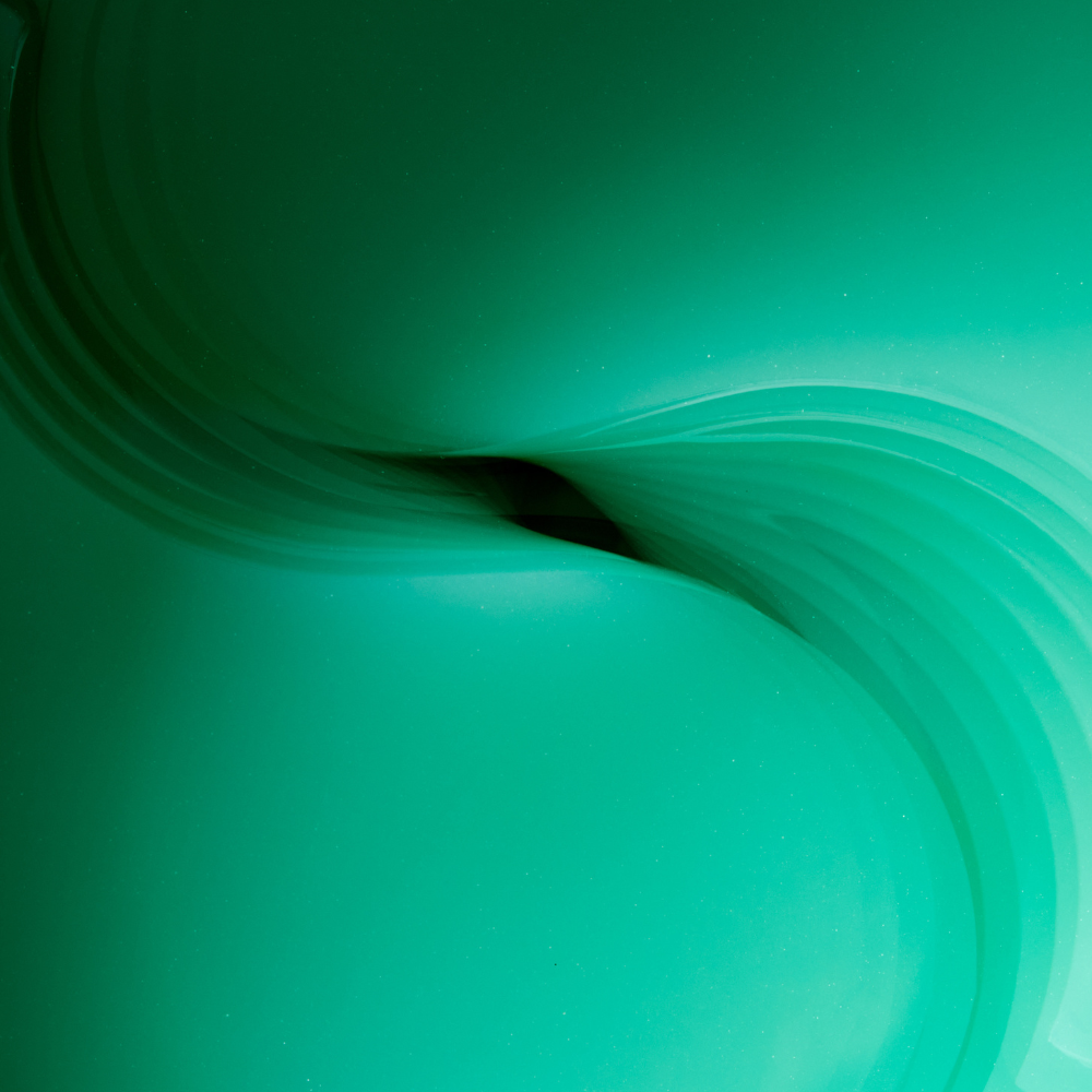 Abstract green wave pattern symbolizing hydration and freshness, perfect for beauty product imagery.