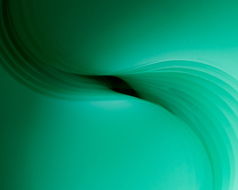 Abstract green wave pattern symbolizing hydration and freshness, perfect for beauty product imagery.