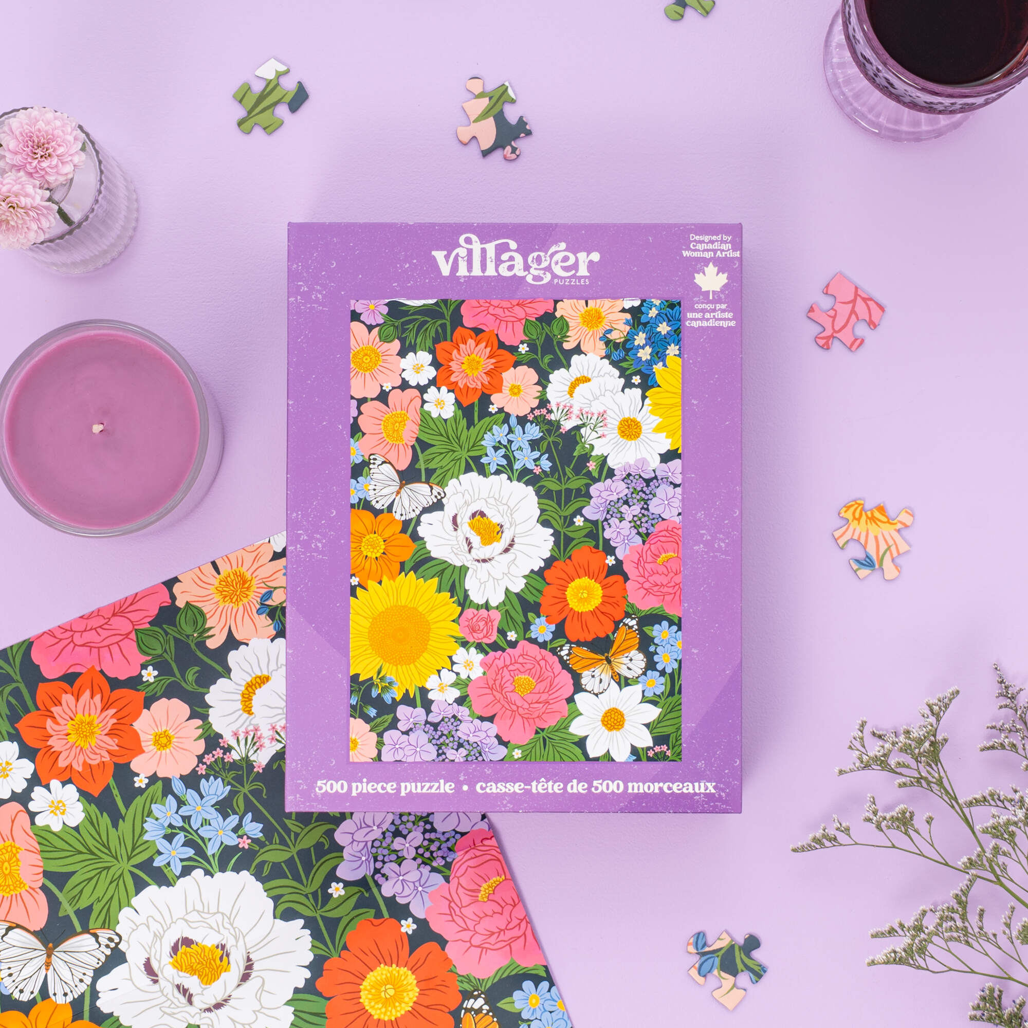 Villager 500 piece puzzle box with floral design on a purple background Midnight Blooms packaging with floral design on a purple background