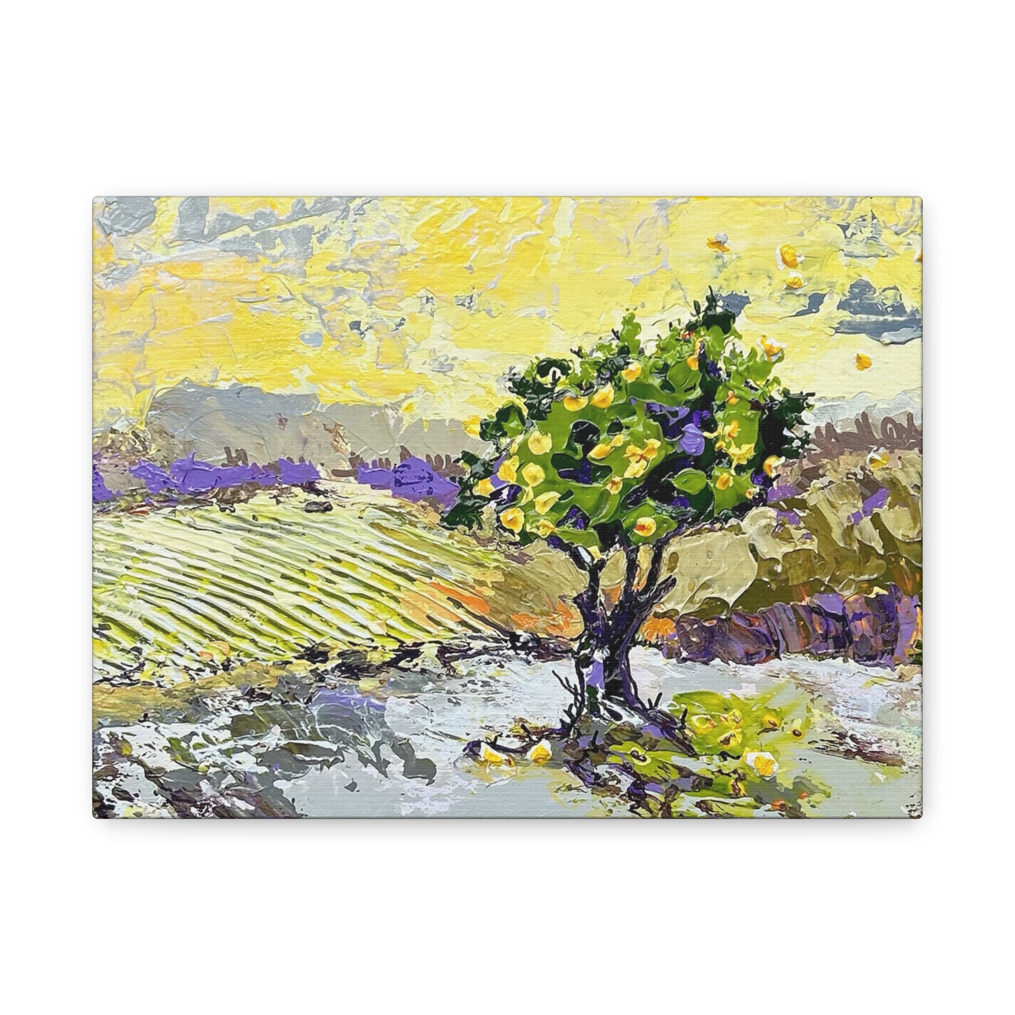 Restless is the Wind Canvas Print | Nancy Overbury An impressionistic landscape painting featuring a prominent green tree with yellow fruit in the foreground, set against a field of purple flowers and a bright yellow sky, shown as a canvas print on a white background.