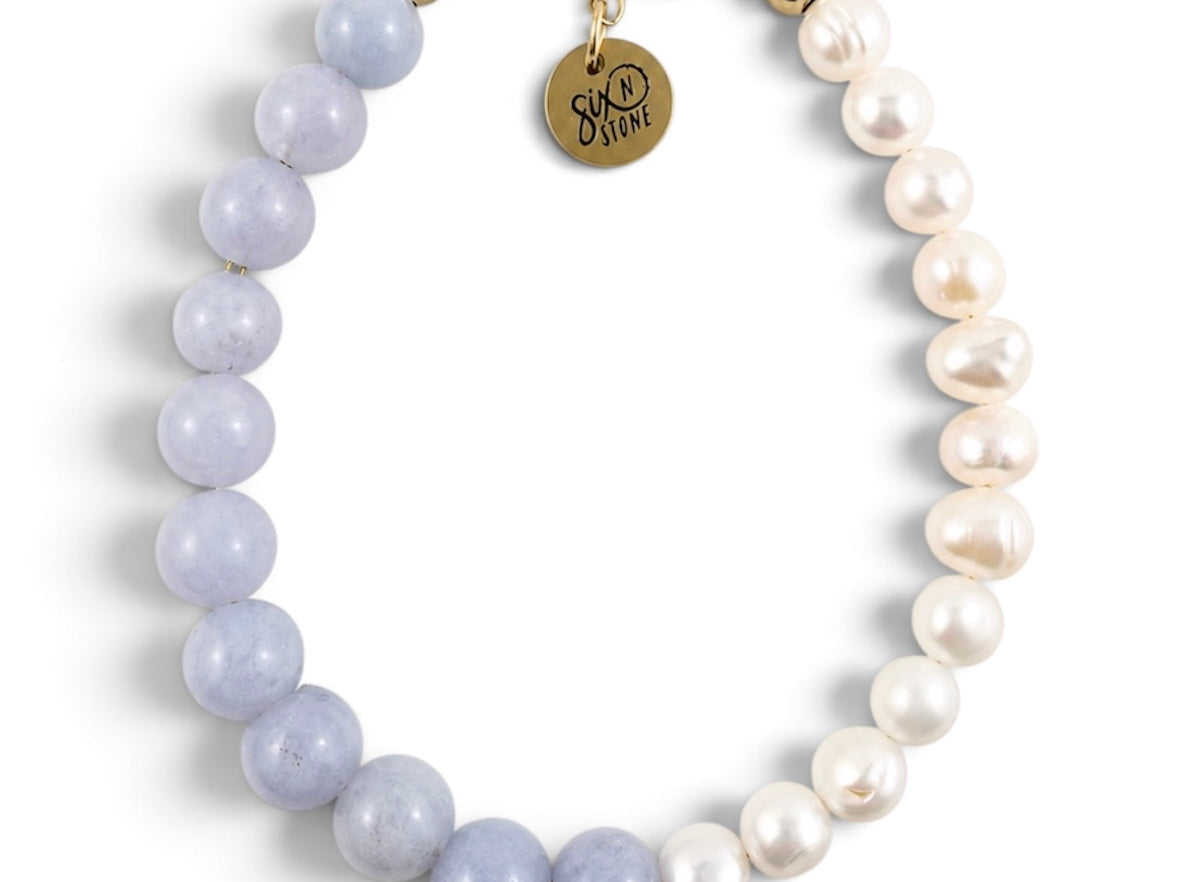 Blueberries & Cream Bracelet beaded bracelet with a split design of Blue Angelite & Pearl Gemstone Bracelet finished with gold-toned hardware and a round gold charm 