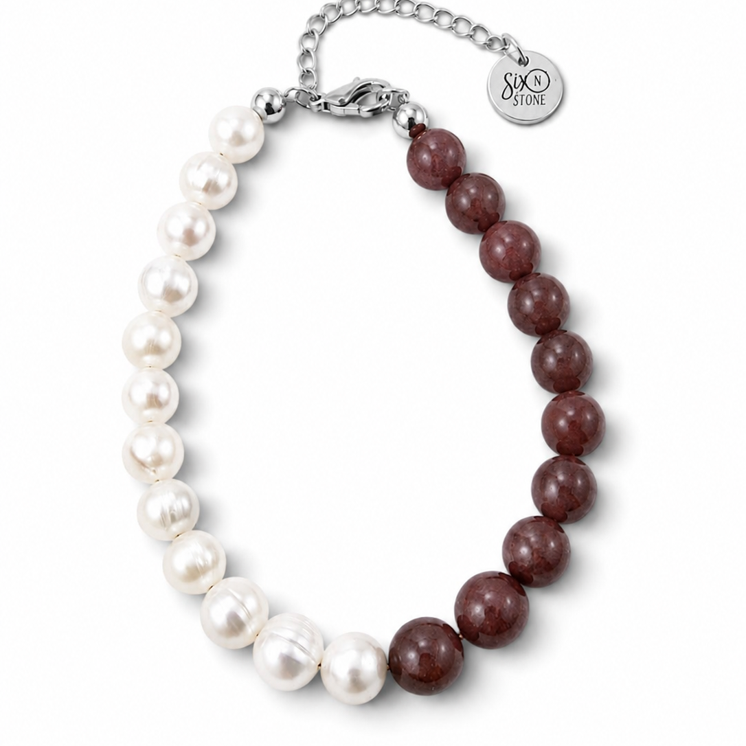 A split-color beaded necklace Strawberries and Cream bracelet made with Natural strawberry quartz gemstones and Naturally cultured freshwater pearls from Six N Stone finished with a silver-tone chain clasp and a round engraved tag.
