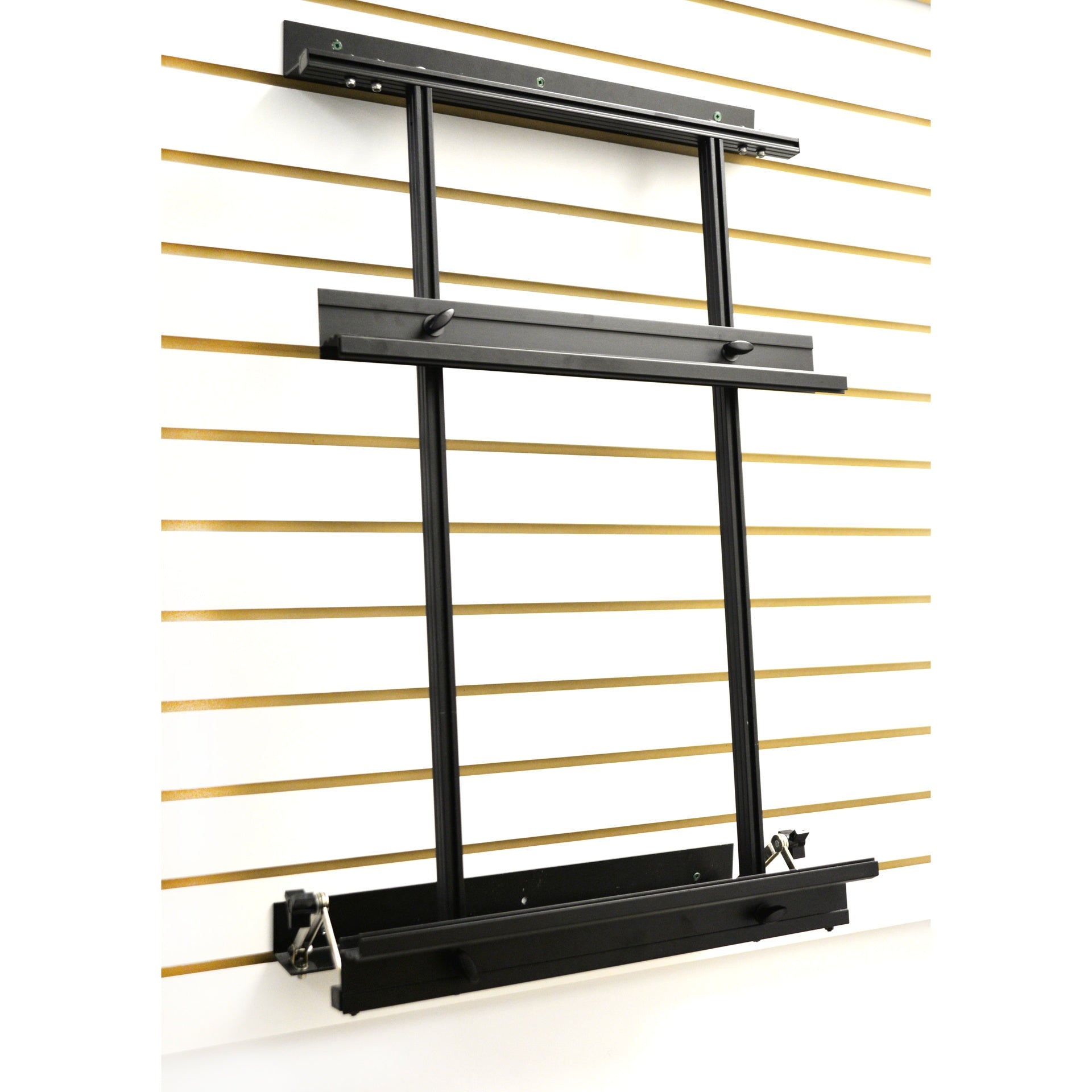 Black metal wall-mounted shelf against a slatted wooden panel background