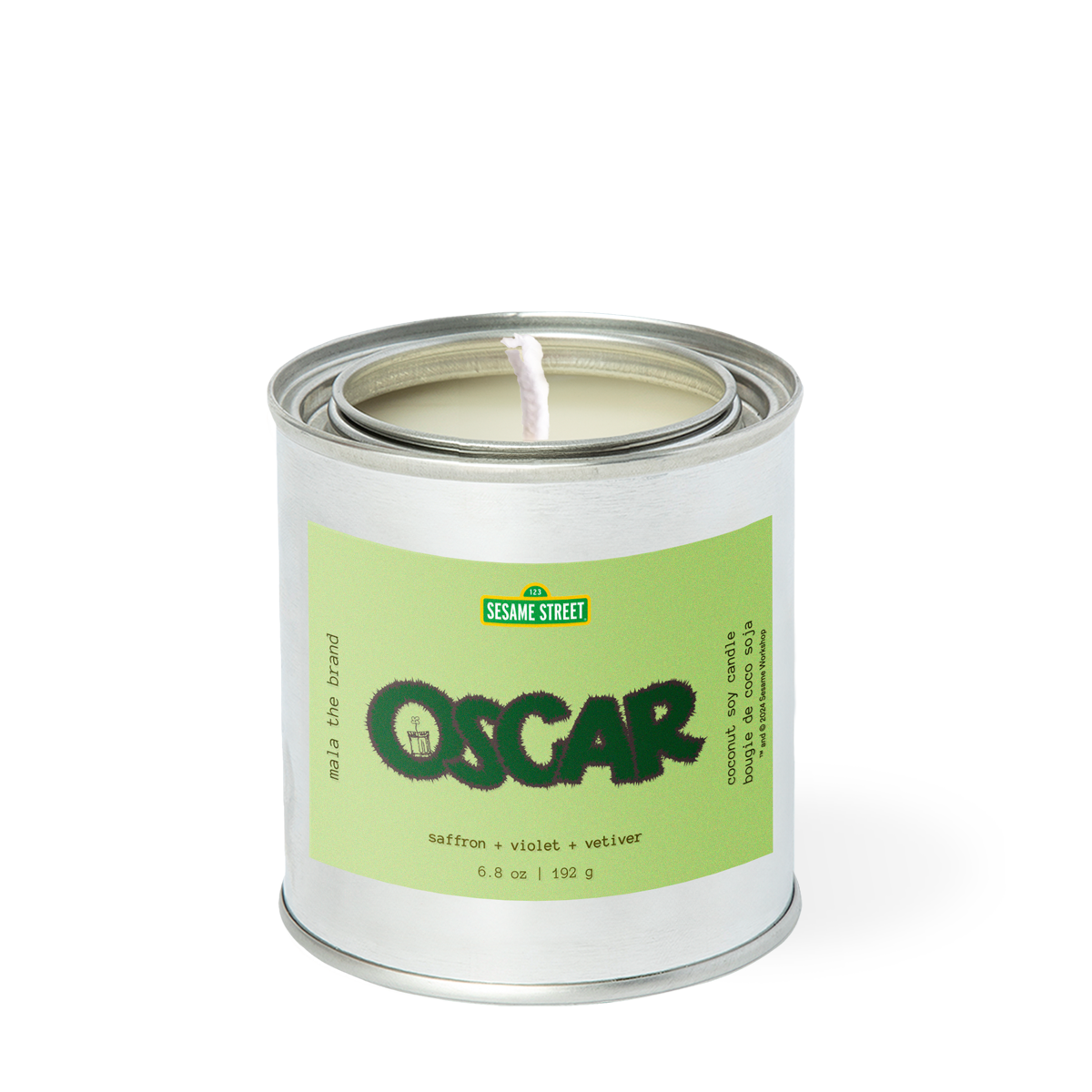 Candle in a can labeled 'Oscar' with Sesame Street branding on a white background