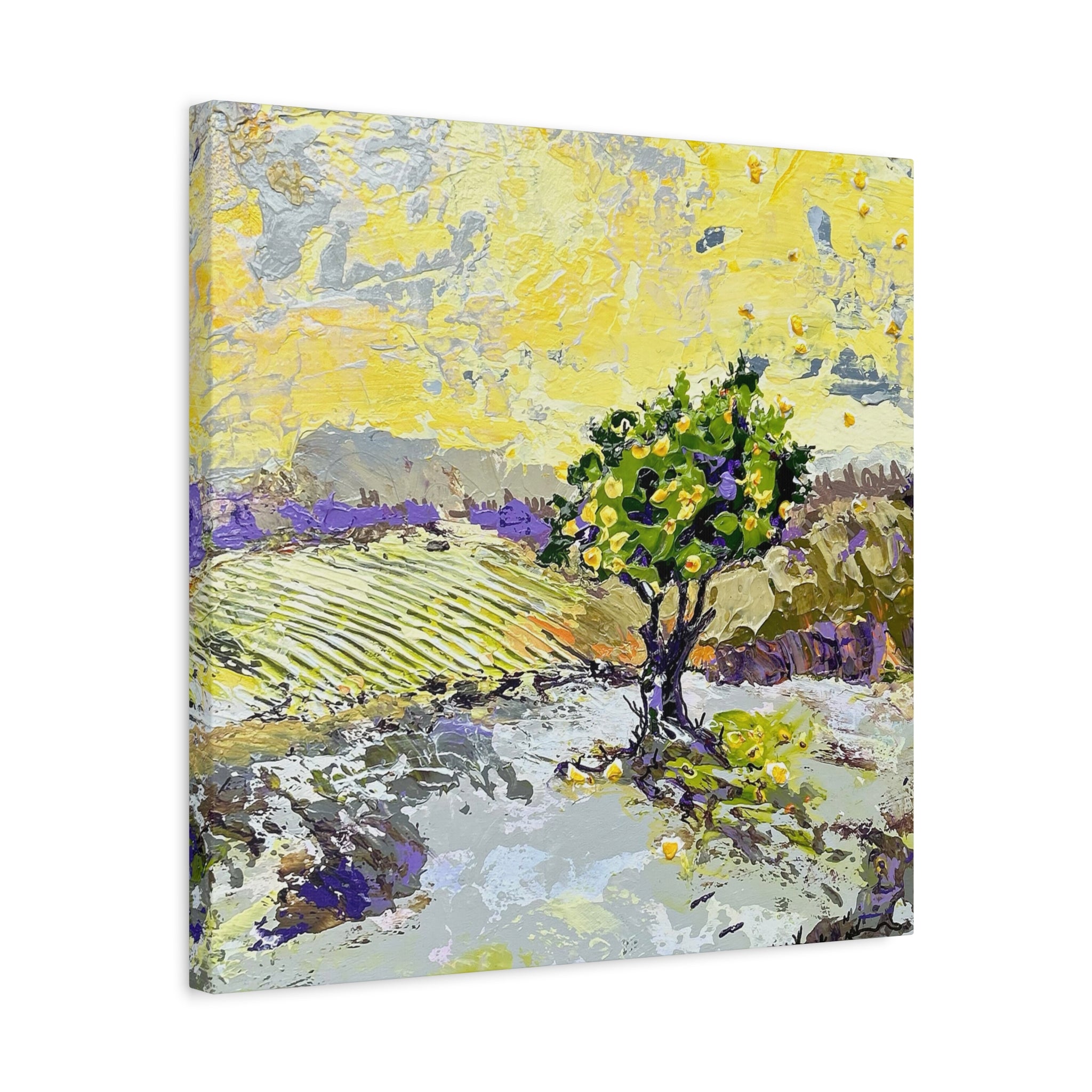 Square canvas wall art featuring an impressionistic landscape painting with a green tree, yellow sky, and lavender fields, shown at an angle against a white background.
