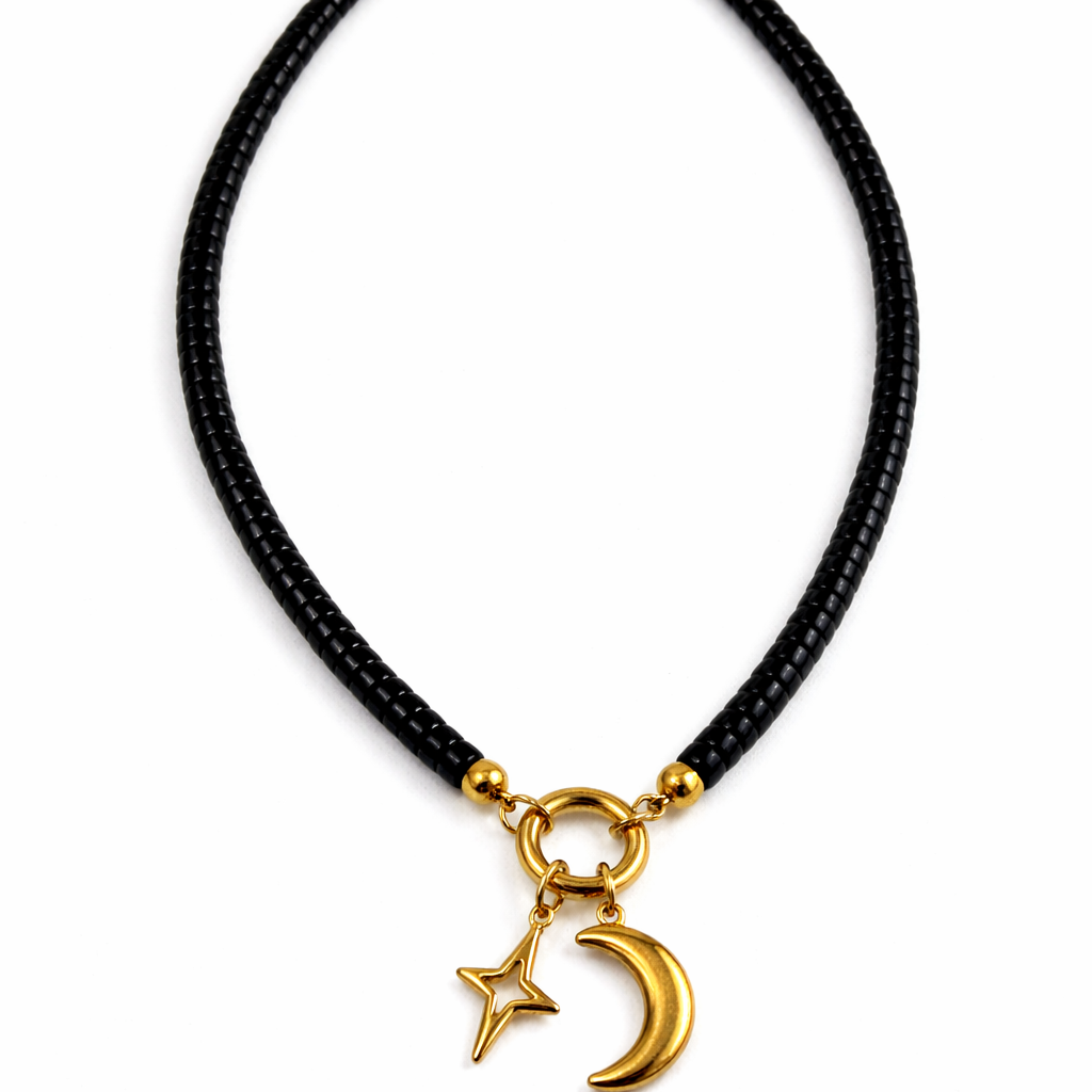 Moonrise Necklace - Onyx necklace with gold moon and star pendant on a white background by Six N Stones