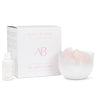 AB Rose Quartz product set with packaging and crystal on a white background