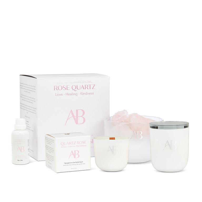 AB Rose Quartz product set including candles and a box on a white background