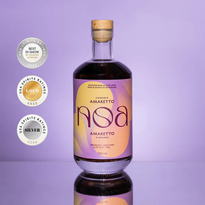 Bottle of Aqva Amaretto on a purple background with awards displayed.