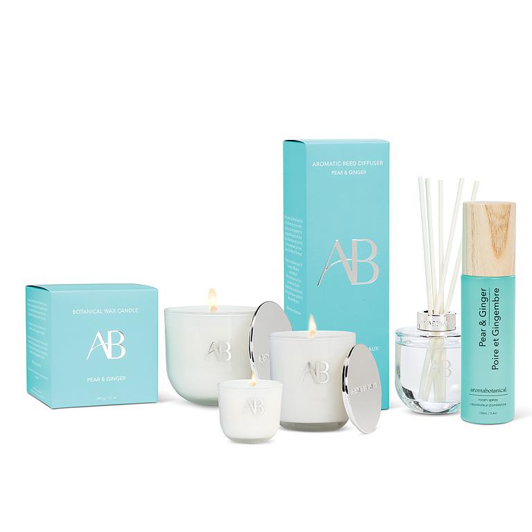 Collection of candles and diffuser with AB branding on a white background