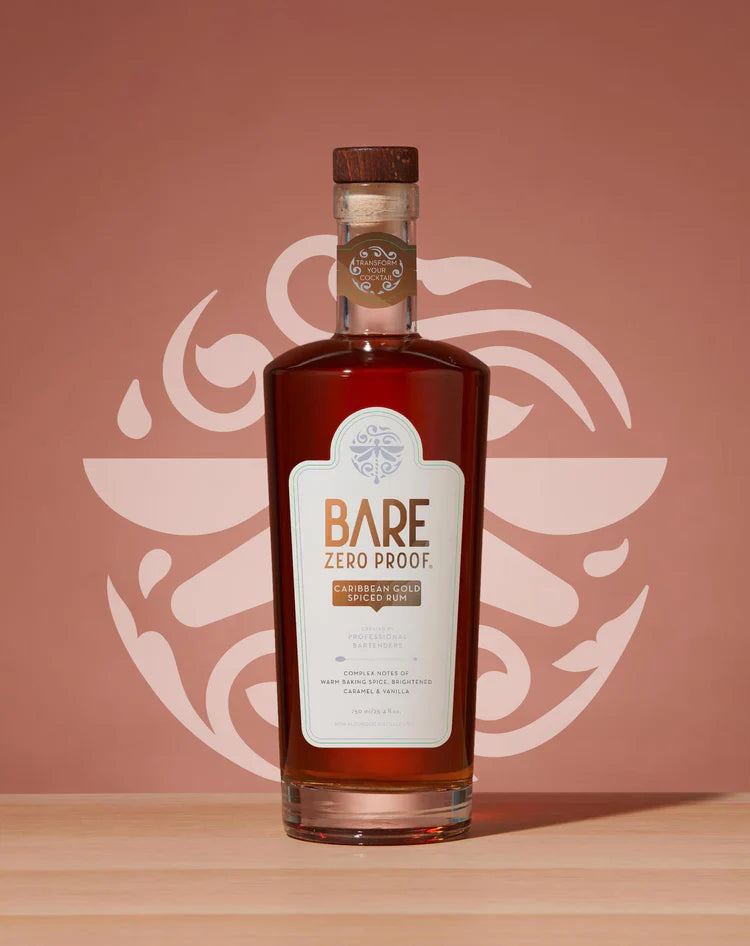 Bottle of Bare Zero Proof alcohol on a wooden surface with a decorative pink background  The Sobr Market