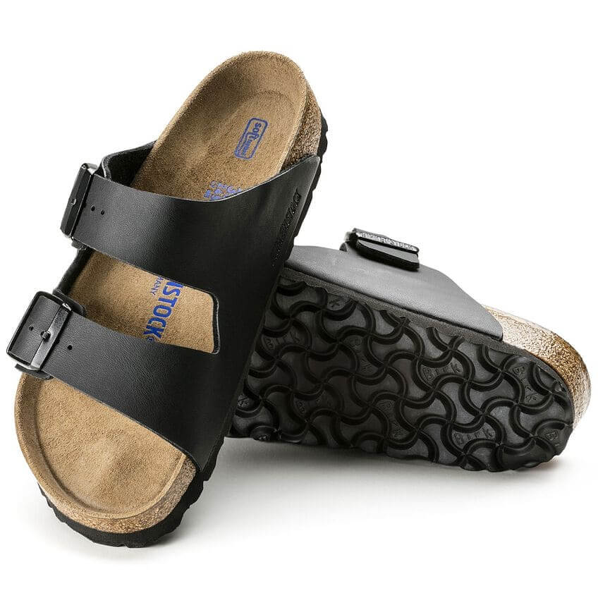 Birkenstock Arizona Soft Footbed sandals in black, featuring two straps and a cushioned sole for enhanced comfort.