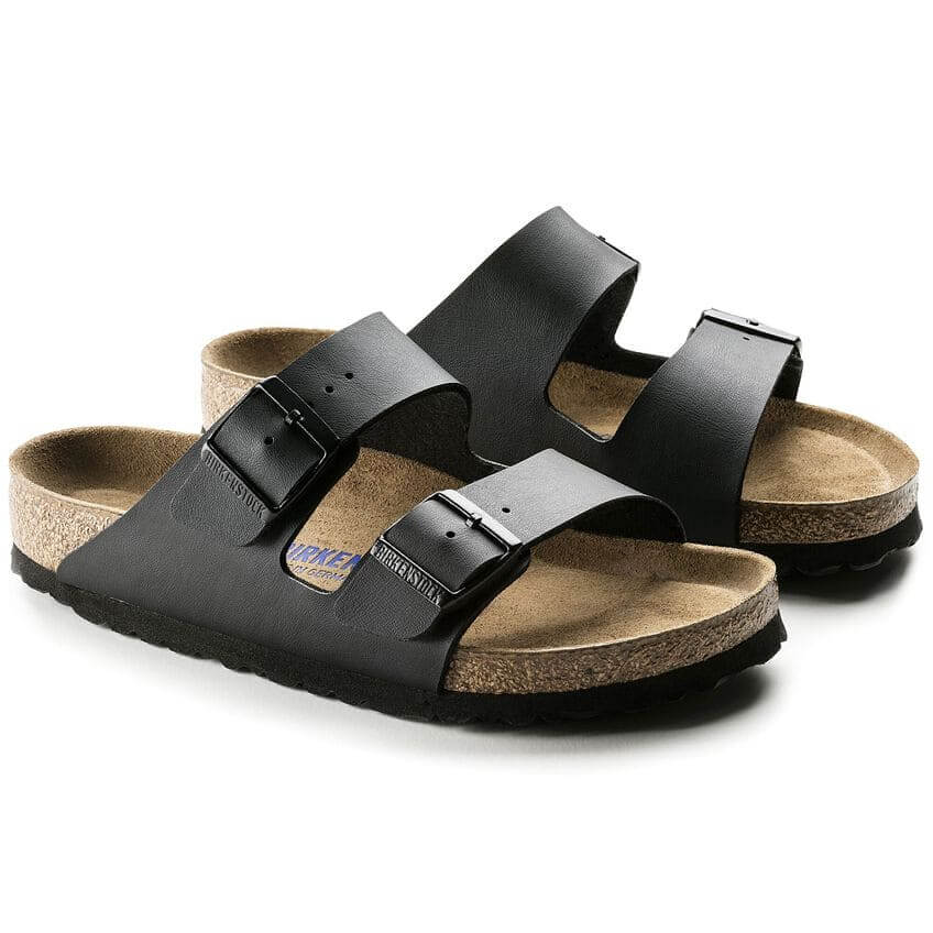 Birkenstock Arizona soft footbed sandals in black Birko-Flor with two straps and cork sole for comfort and style.