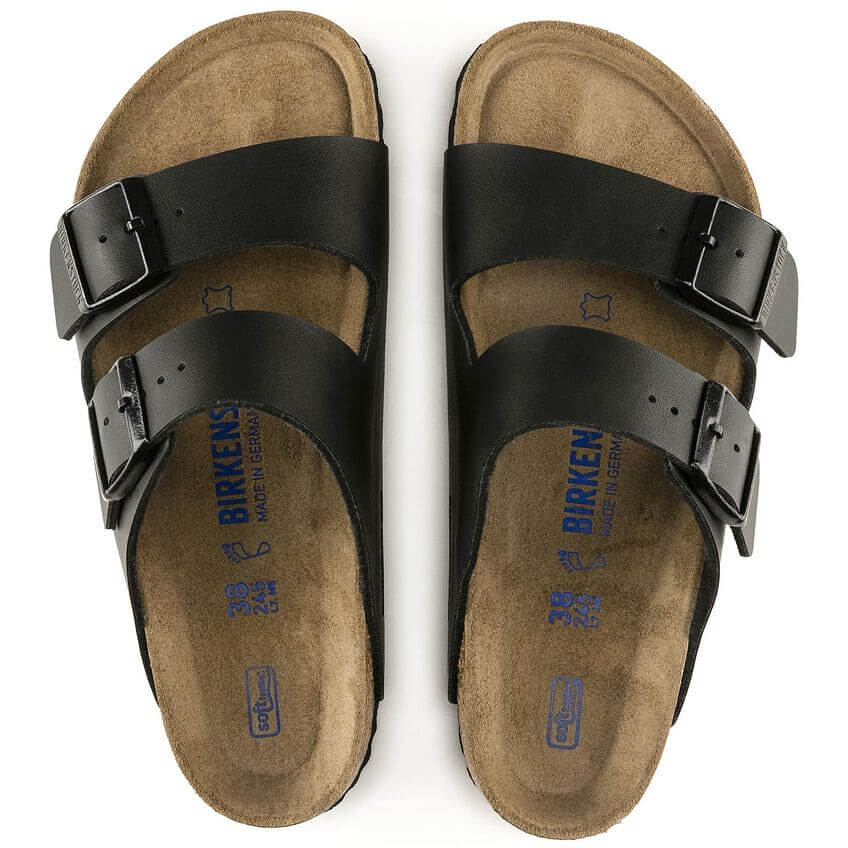 Birkenstock Arizona Soft Footbed sandals in black with two straps and cushioned footbed for comfort.