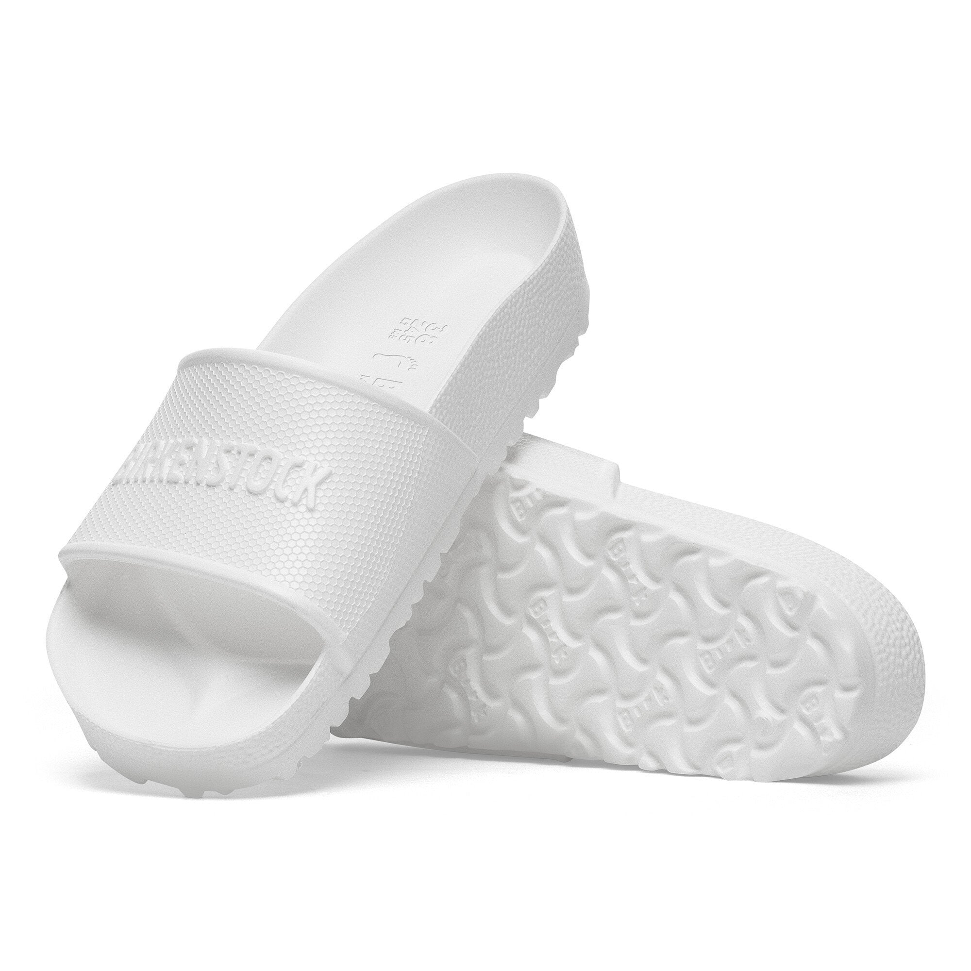 Birkenstock Barbados Essentials EVA in white, lightweight and water-friendly slide sandals with contoured footbed.