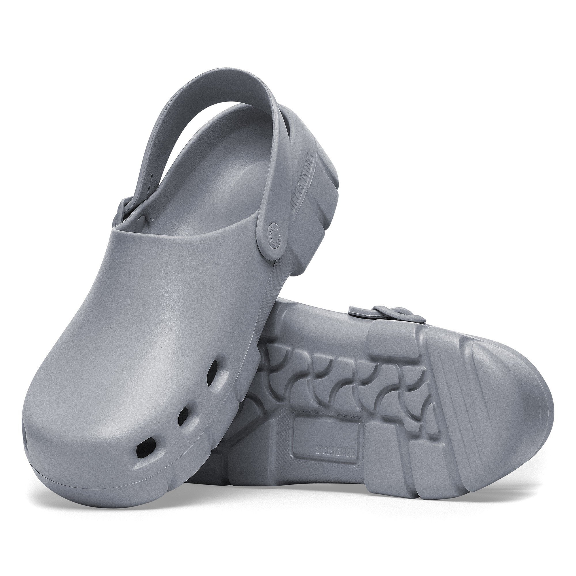 Birkenstock Birki Flow EVA clog in stone color, featuring adjustable backstrap and breathable design.