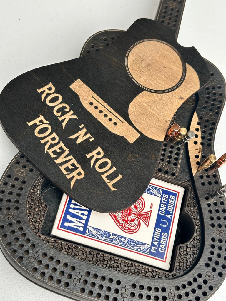 Guitar-shaped card holder with 'Rock 'n Roll Forever' text and a deck of cards inside.