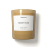 Scented candle labeled 'Desert Rose' by BURSERA on a white background