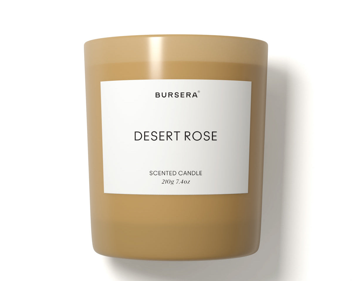 Scented candle labeled 'Desert Rose' by BURSERA on a white background