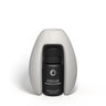 Black essential oil bottle labeled 'Calm' on a white background